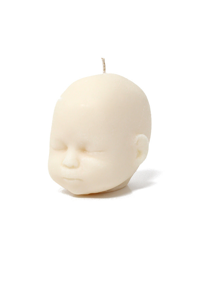 The Blackened Teeth Baby Doll Candle Ivory