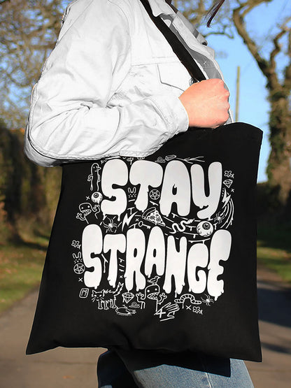 Stay Strange Black Tote Bag